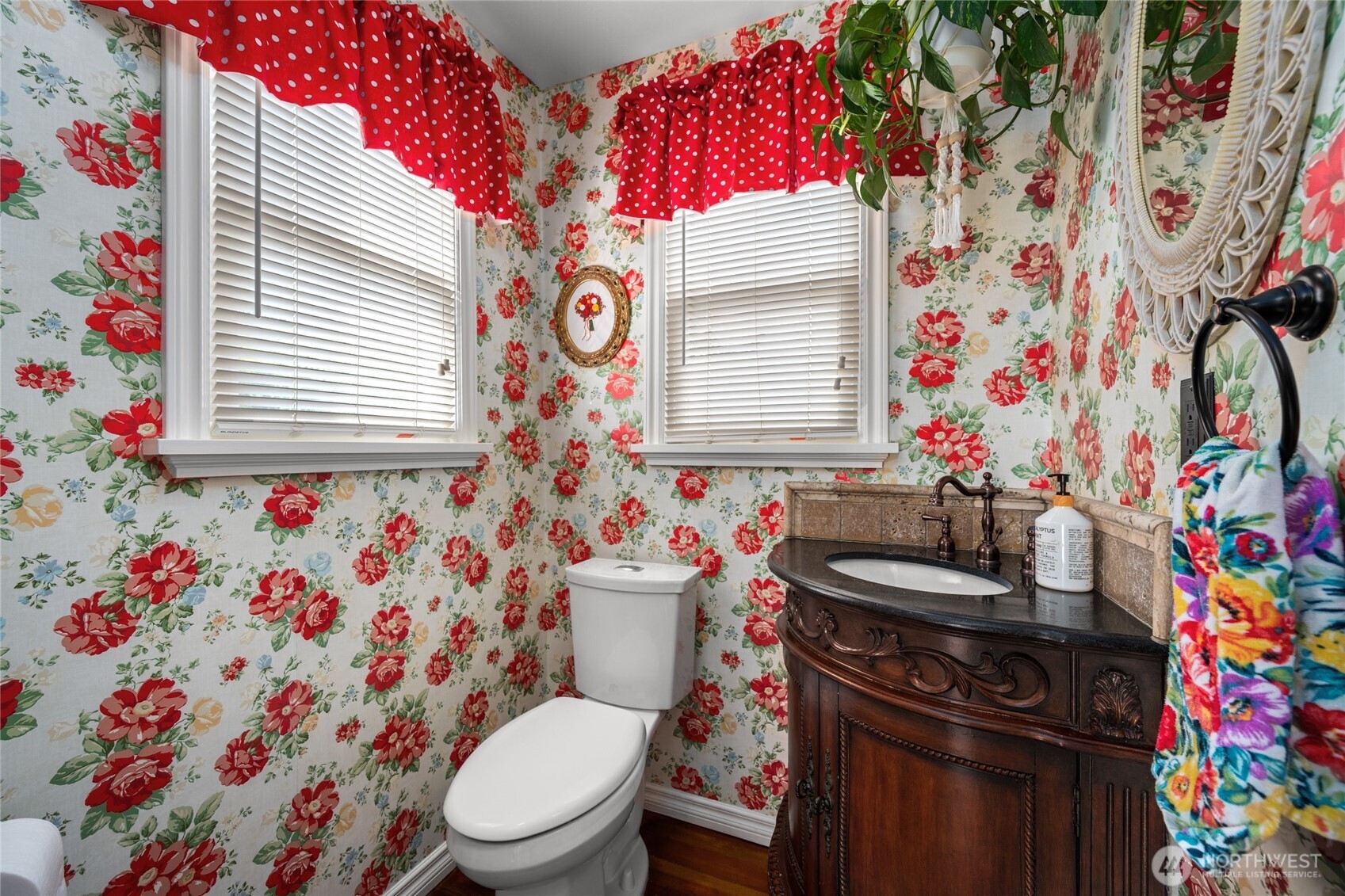 1507 15th Street Anacortes, WA 98221 - Photo 21 of 40 a bathroom with a sink toilet and a mirror
