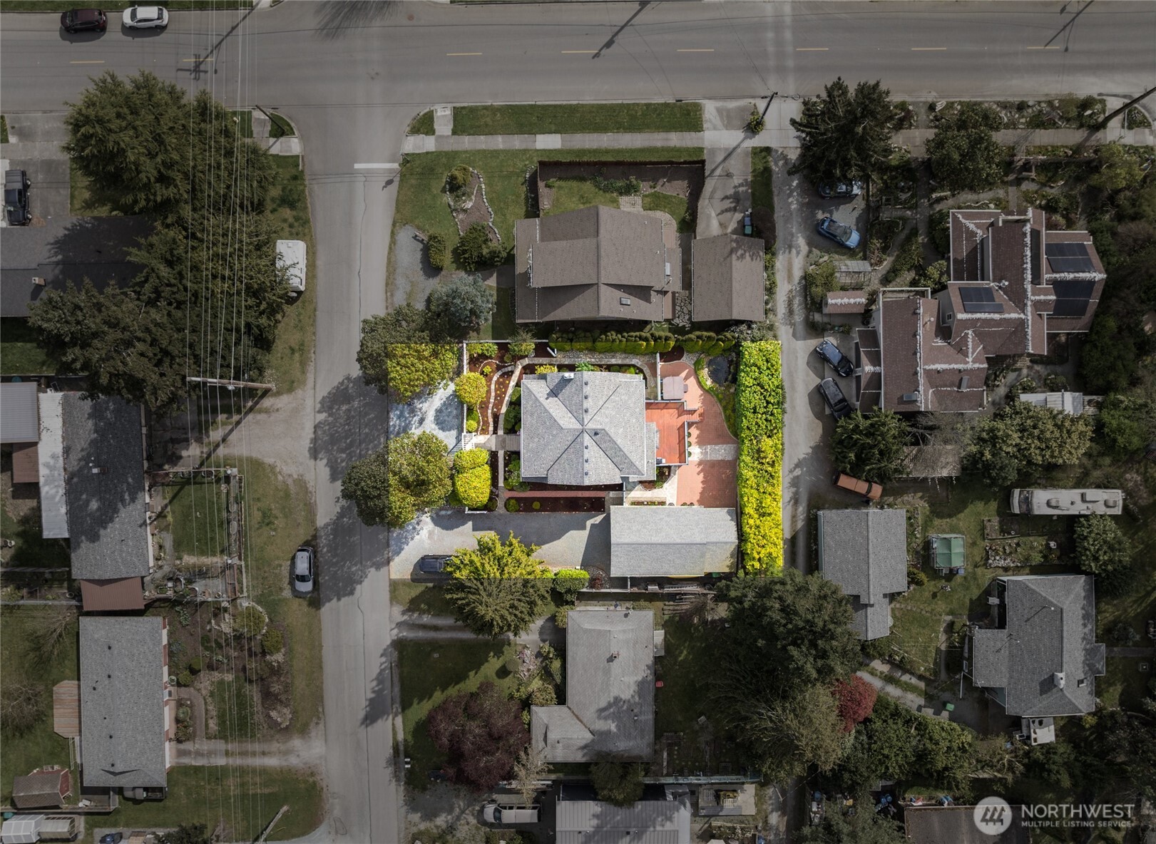 1507 15th Street Anacortes, WA 98221 - Photo 27 of 40 an aerial view of a house with a garden and plants