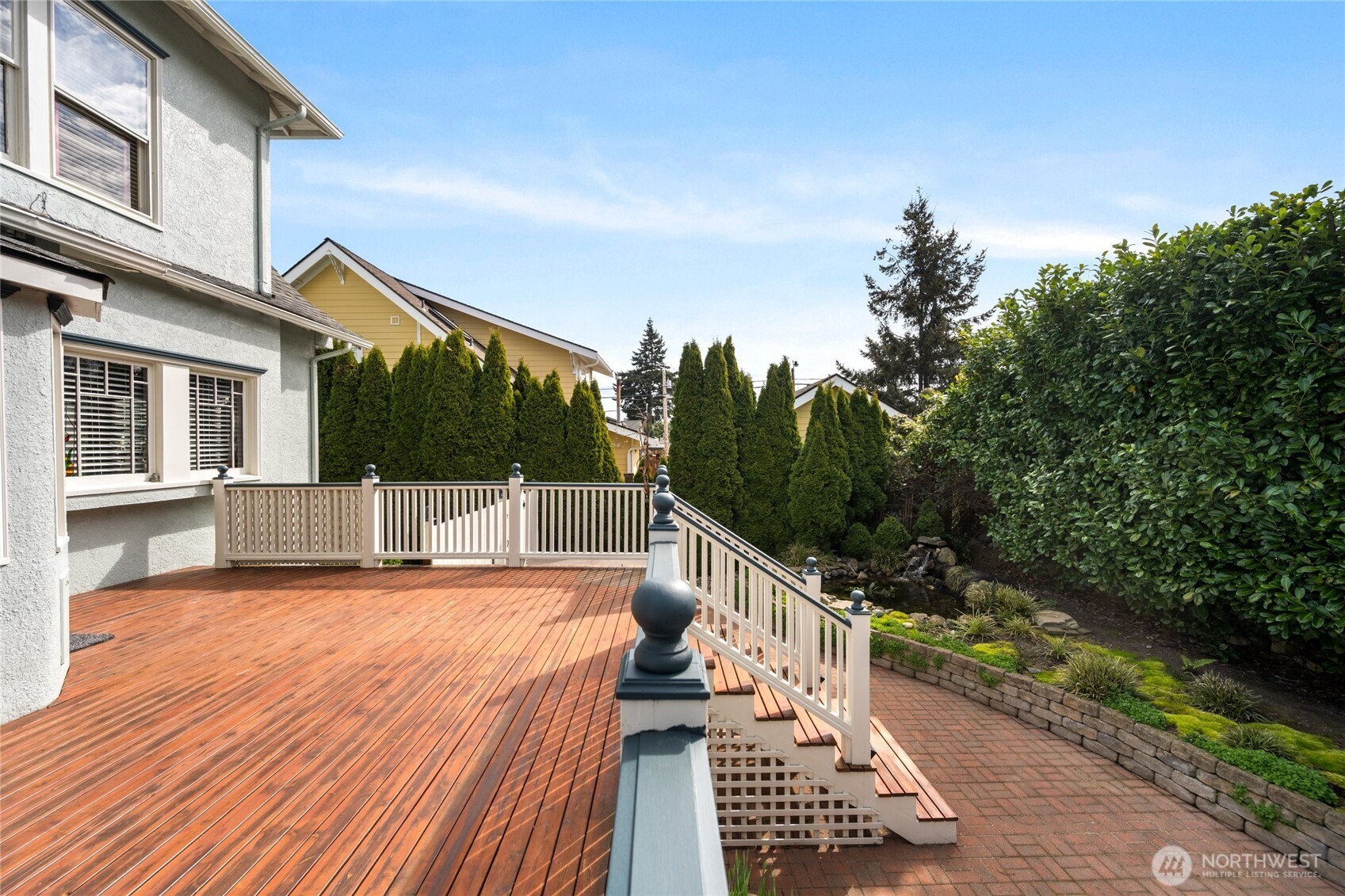 1507 15th Street Anacortes, WA 98221 - Photo 30 of 40 a view of a house with backyard and deck