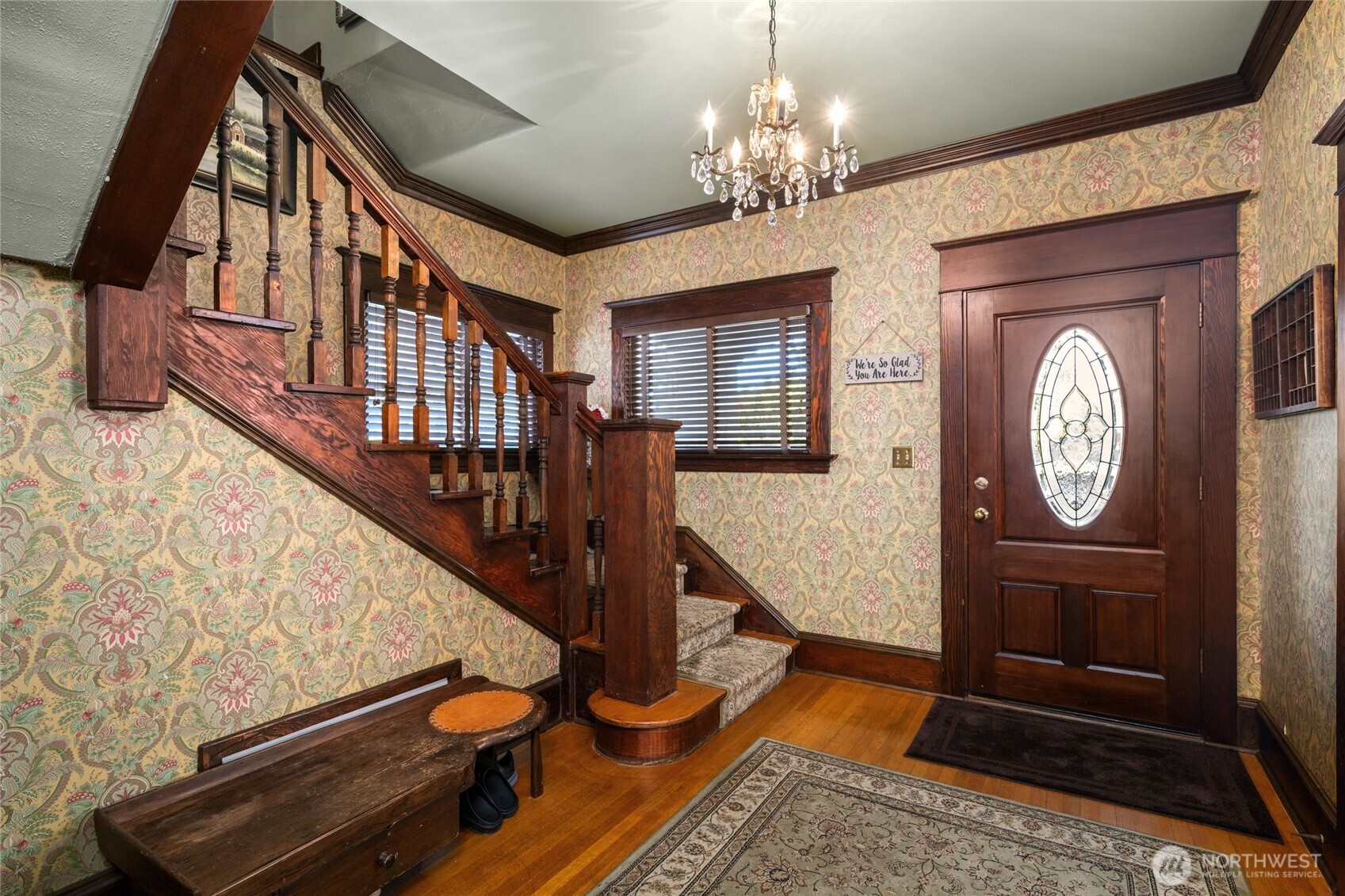 1507 15th Street Anacortes, WA 98221 - Photo 3 of 40 a view of a hallway with wooden floor and staircase