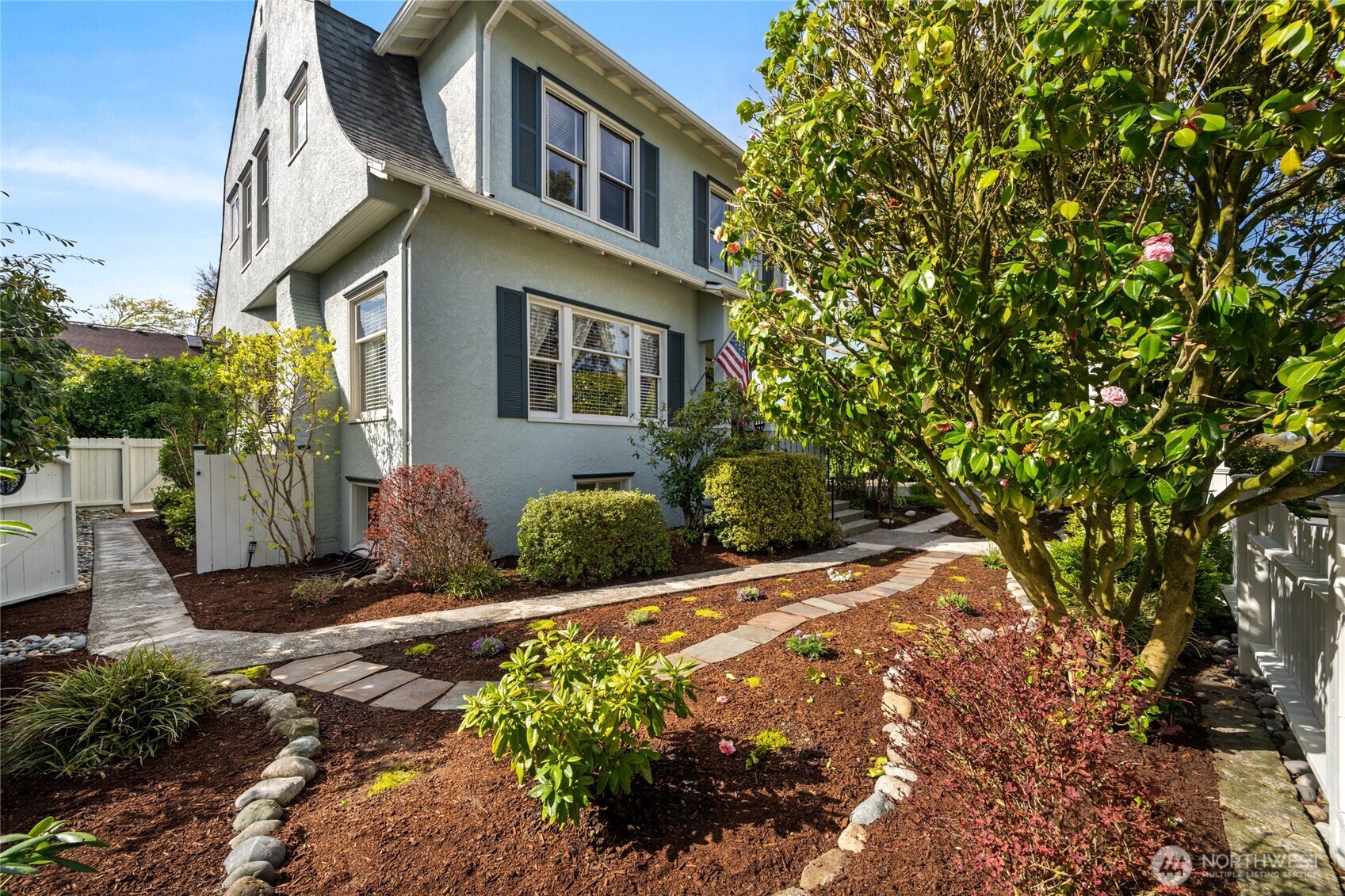 1507 15th Street Anacortes, WA 98221 - Photo 34 of 40 a front view of a house with a yard