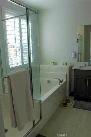 a bathroom with a bathtub sink and toilet