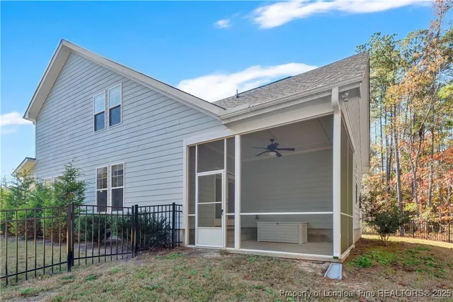 swimming pool view with sitting space and garden