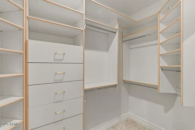 a view of a house with a yard and garage