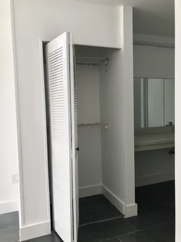 a view of a room with an empty space