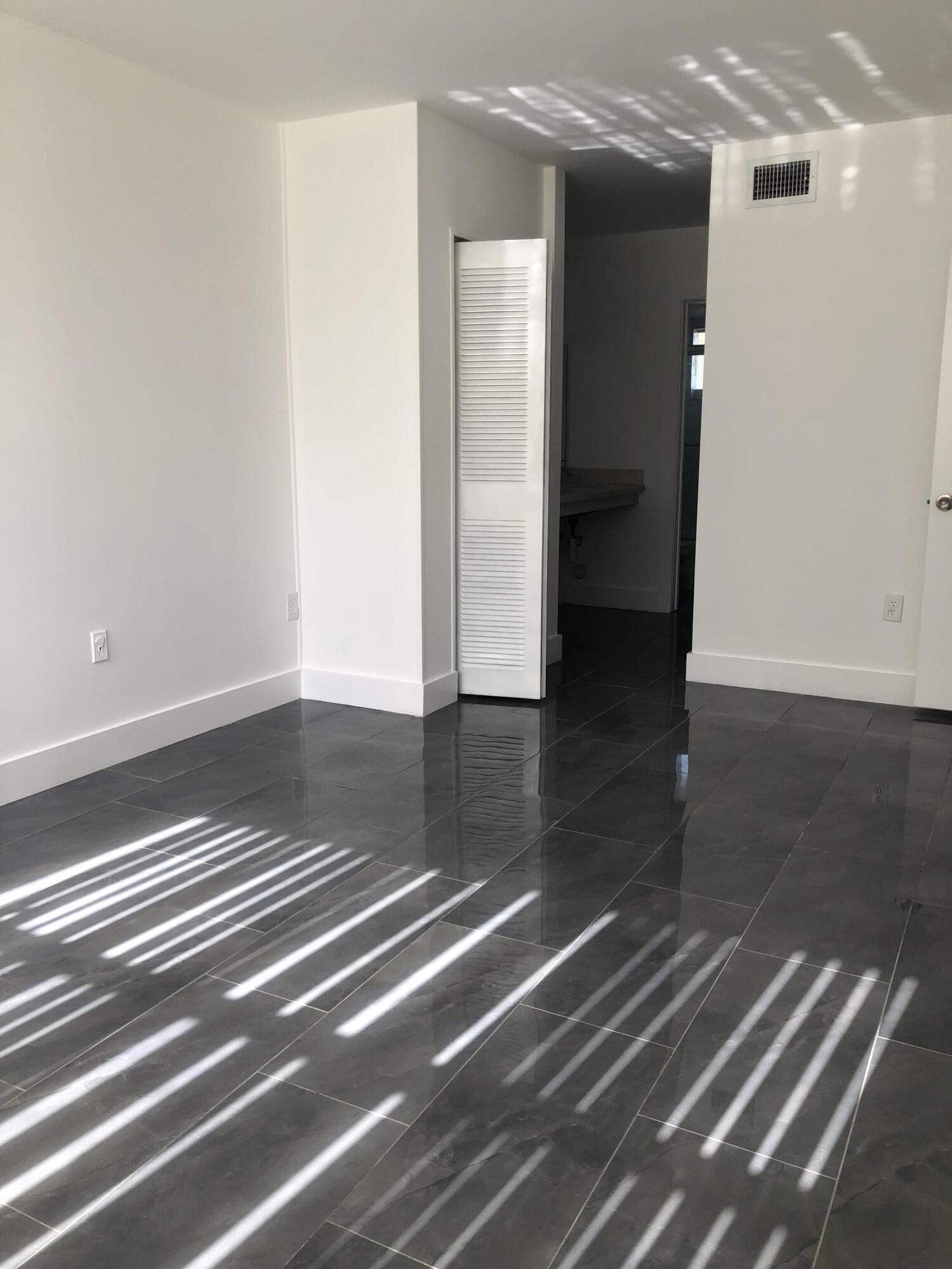 6850 Royal Palm Boulevard, Unit 104G Margate, FL 33063 - Photo 14 of 17 a view of an empty room