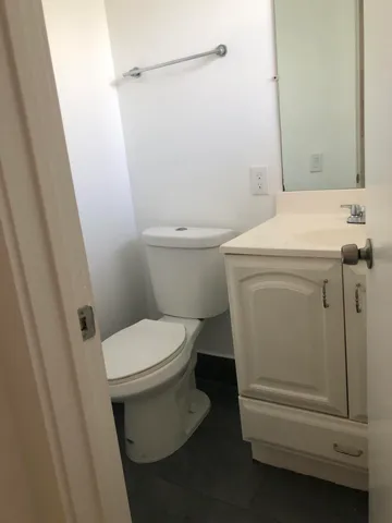 a bathroom with a bathtub and a toilet