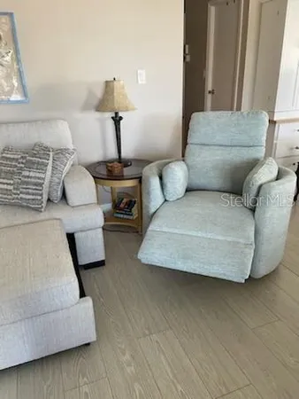 a living room with furniture and a couch