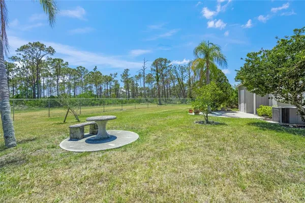 a view of a garden with a fountain