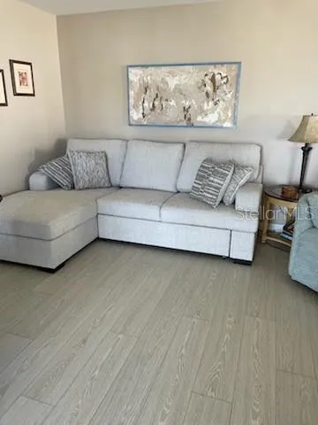 a living room with furniture and a couch