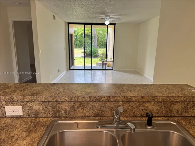 $225,000 | 5661 Riverside Drive, Unit 101B7, Coral Springs, FL 33067
