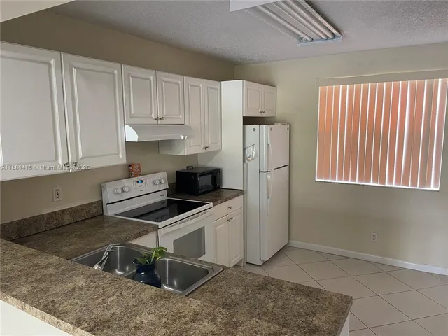 $225,000 | 5661 Riverside Drive, Unit 101B7, Coral Springs, FL 33067