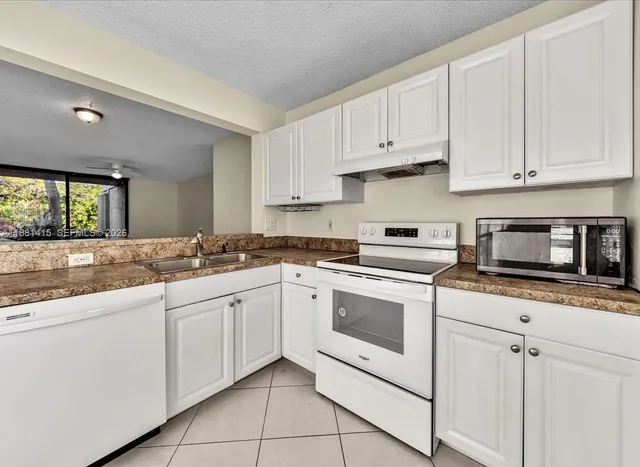 $215,000 | 5661 Riverside Drive, Unit 101B7, Coral Springs, FL 33067
