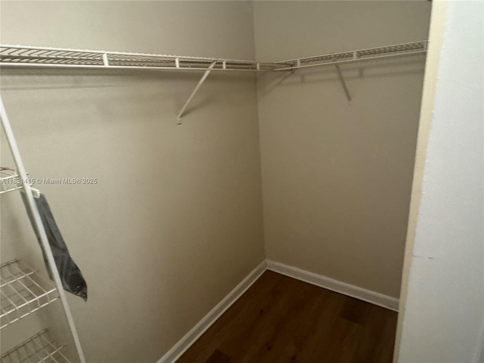5661 Riverside Drive, Unit 101B7 Coral Springs, FL 33067 - Photo 26 of 60 a view of a room with racks on the wall