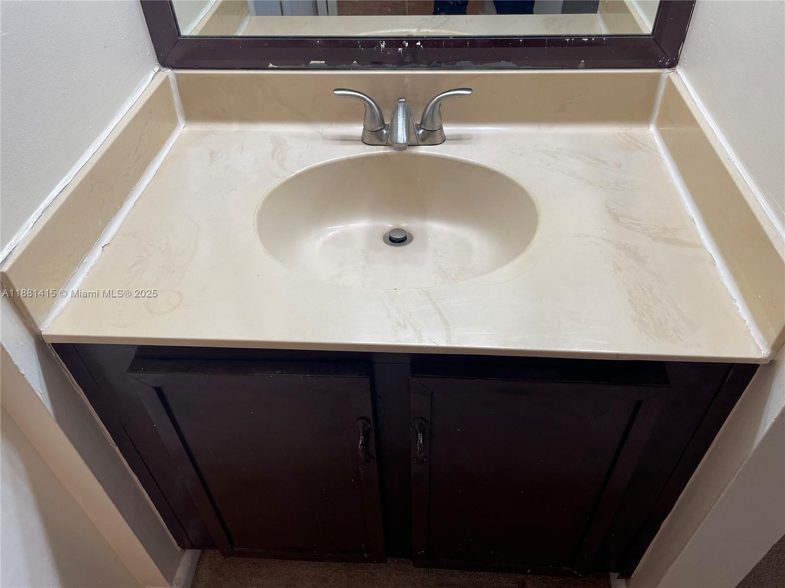 5661 Riverside Drive, Unit 101B7 Coral Springs, FL 33067 - Photo 29 of 60 a close view of sink