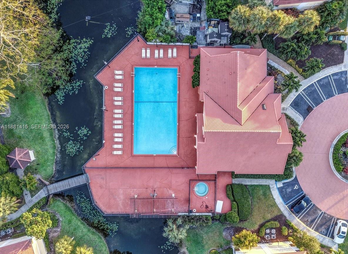 5661 Riverside Drive, Unit 101B7 Coral Springs, FL 33067 - Photo 46 of 49 an aerial view of a house