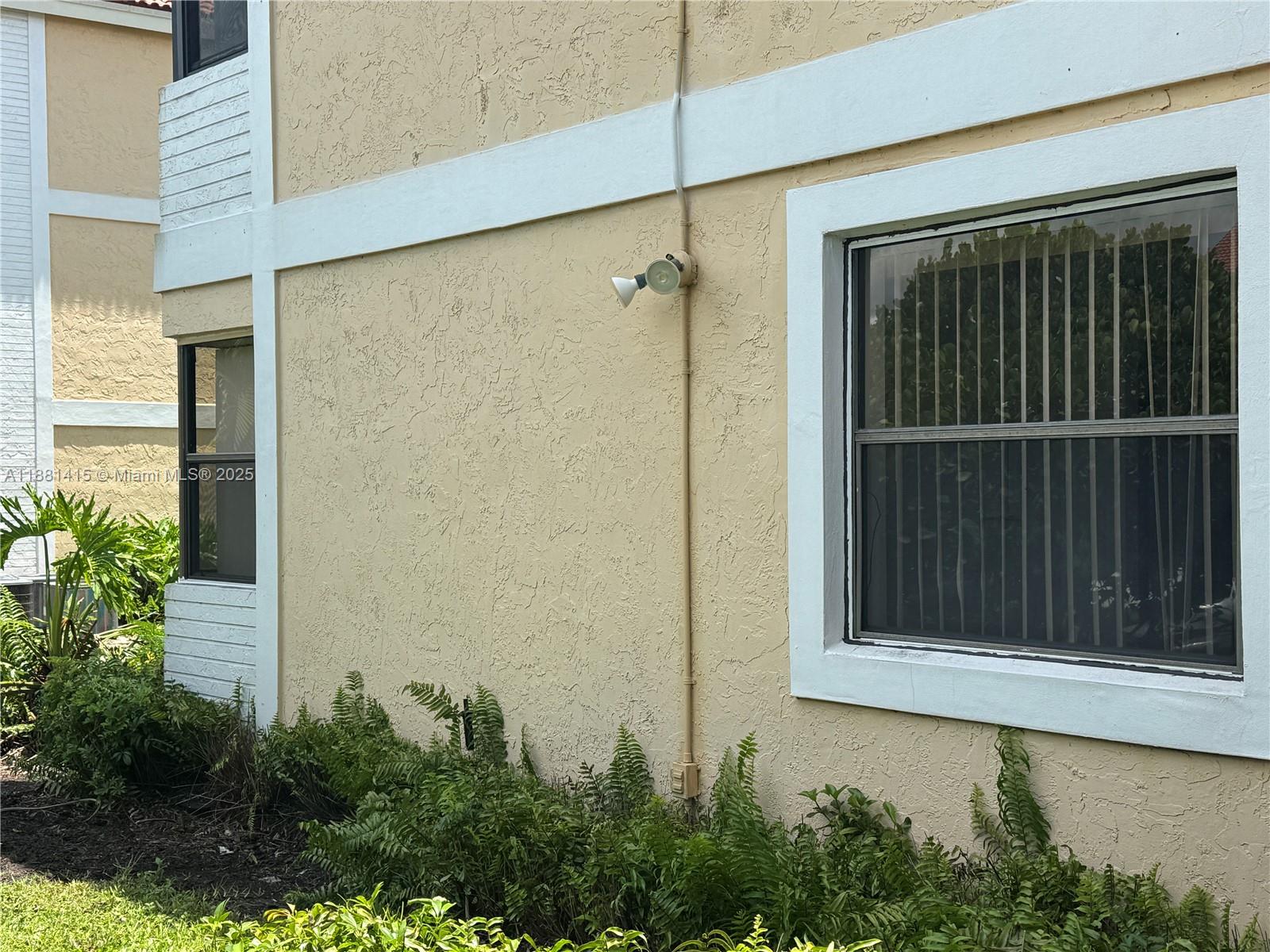 5661 Riverside Drive, Unit 101B7 Coral Springs, FL 33067 - Photo 57 of 60 a view of a door