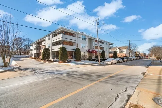 a view of a building with a street