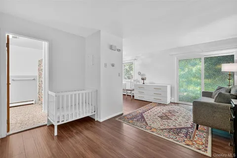 a view of a kitchen from the living room