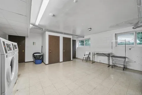 a view of a house with backyard and porch