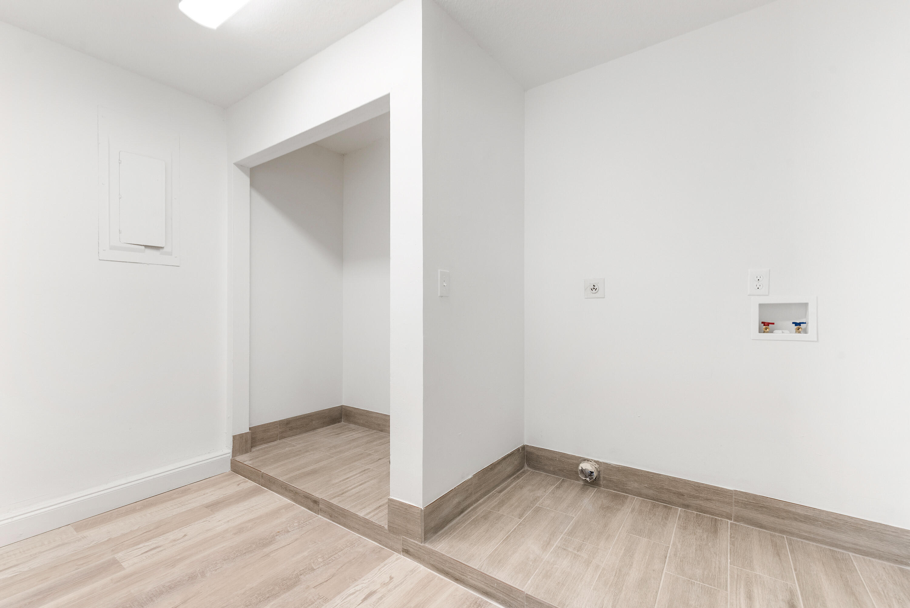 5629 Southeast Collins Avenue Stuart, FL 34997 - Photo 17 of 39 an empty room with wooden floor