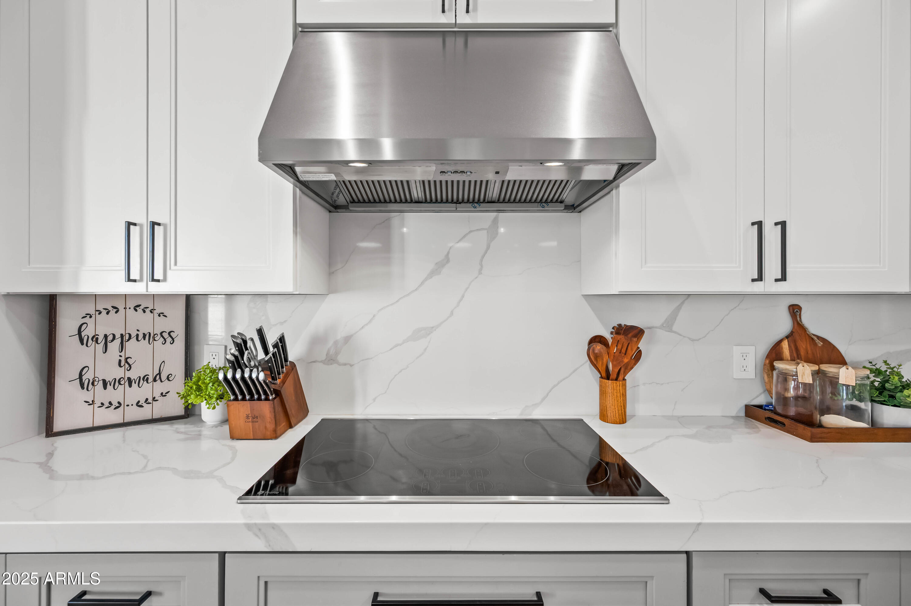 22145 West Harwell Road Buckeye, AZ 85326 - Photo 37 of 86 a kitchen with a stove and cabinets