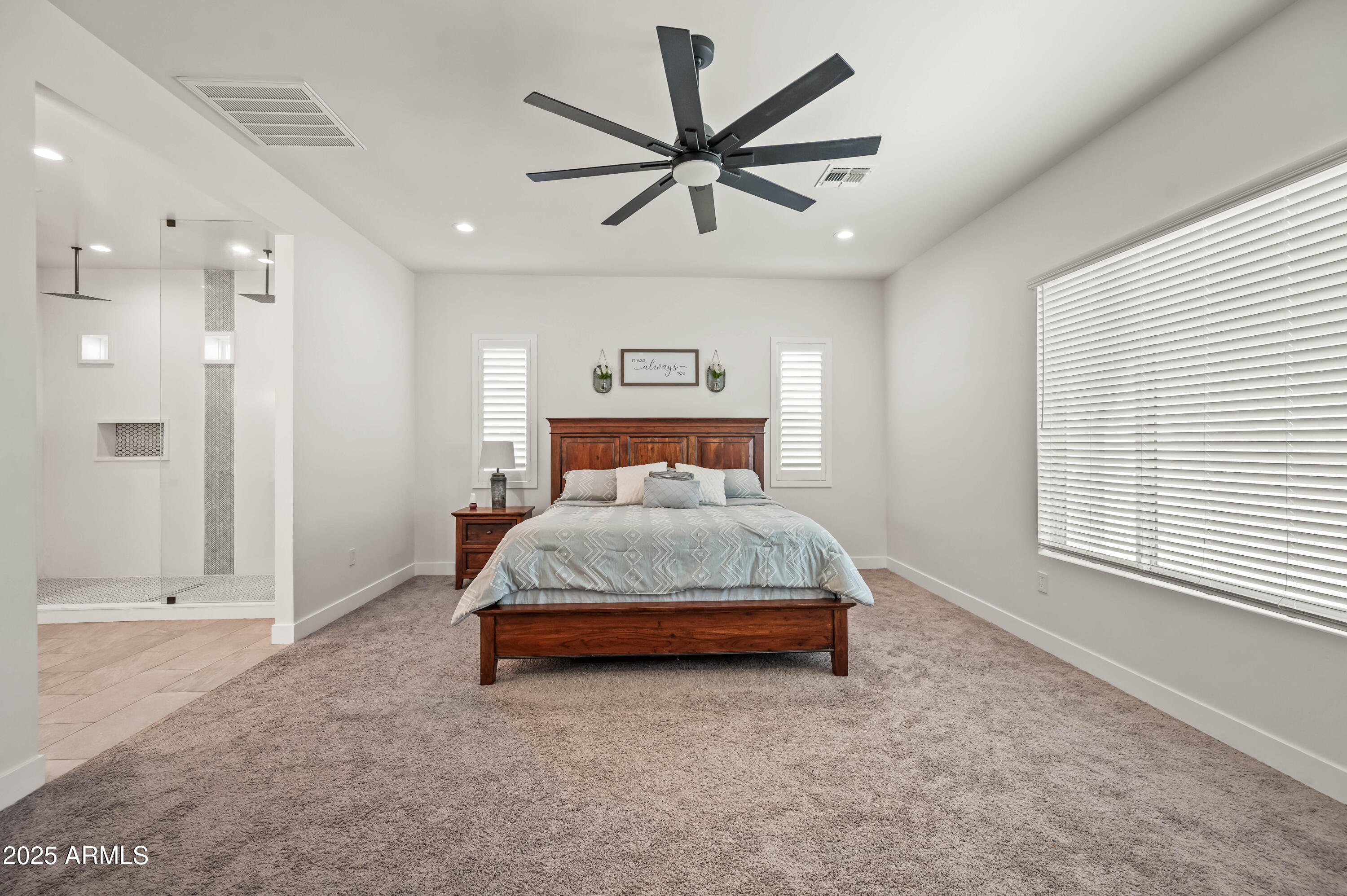 22145 West Harwell Road Buckeye, AZ 85326 - Photo 47 of 86 a bedroom with a bed and window