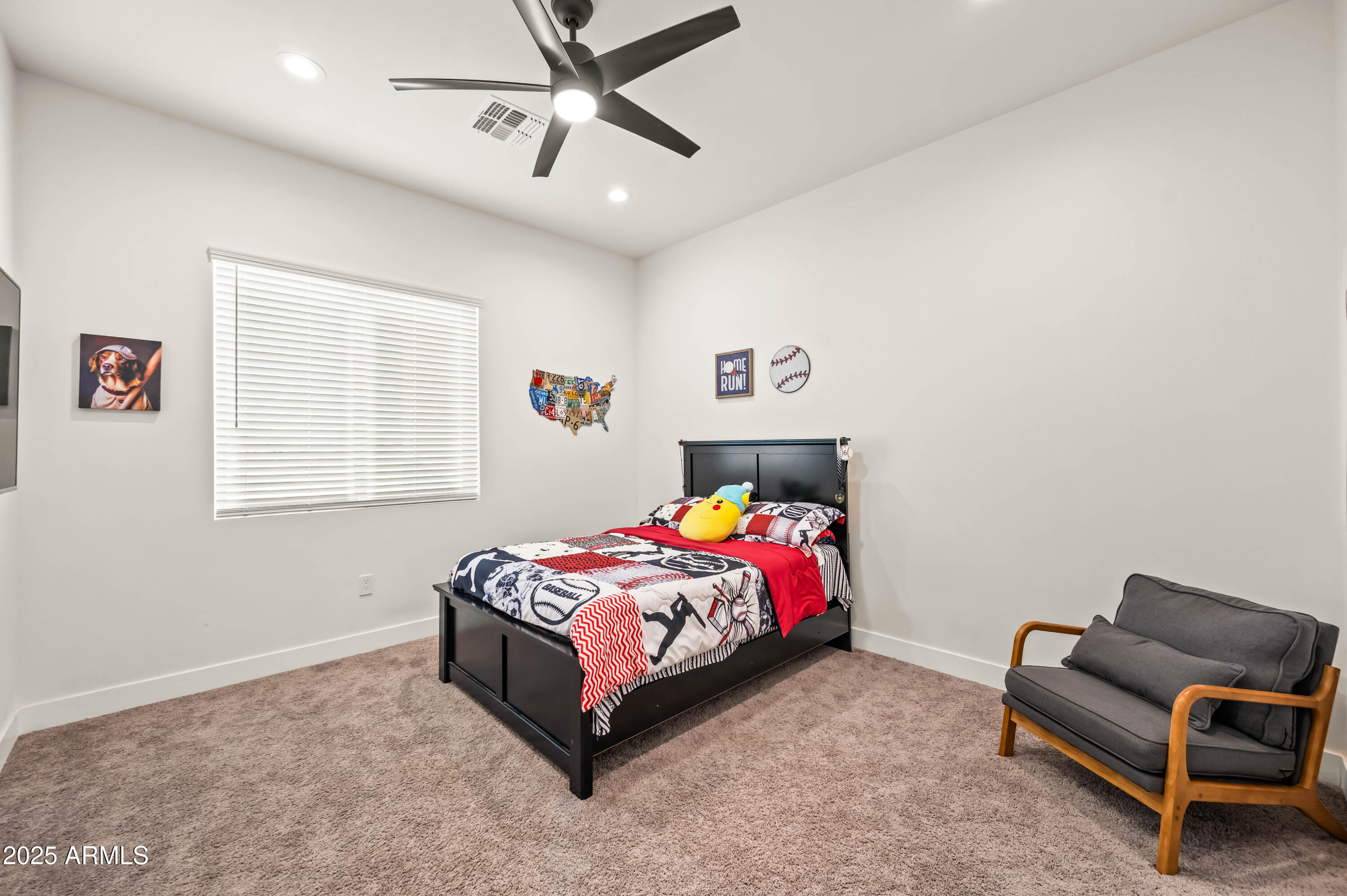 22145 West Harwell Road Buckeye, AZ 85326 - Photo 61 of 86 a bedroom with a bed and a window