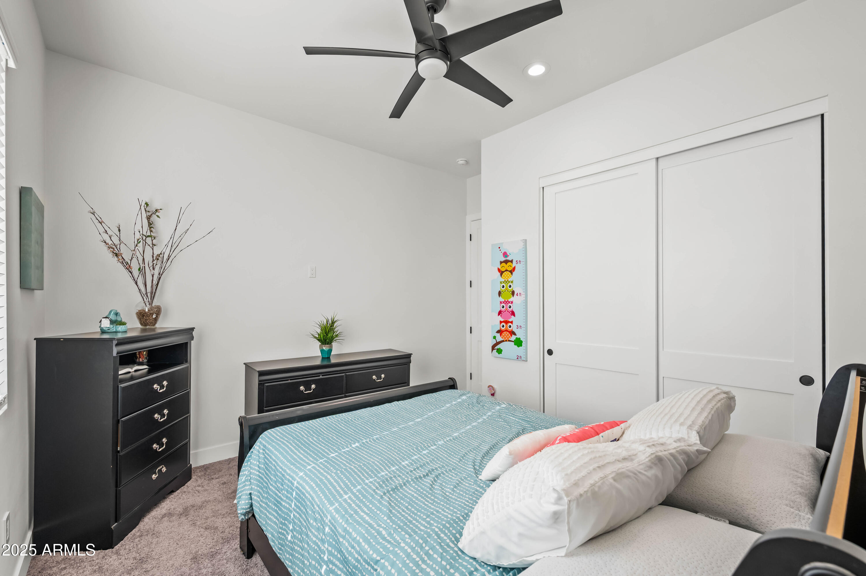 22145 West Harwell Road Buckeye, AZ 85326 - Photo 66 of 86 a bedroom with a bed and furniture