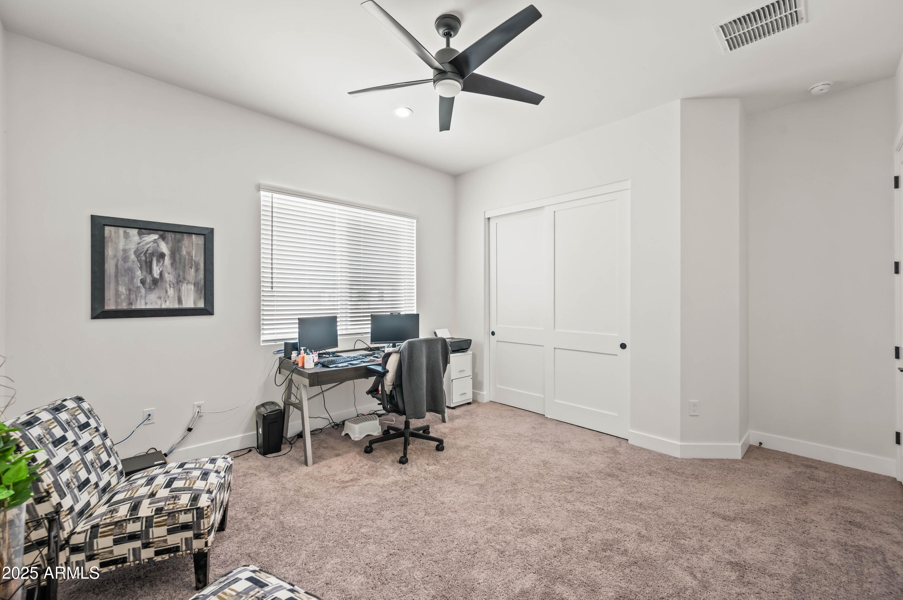 22145 West Harwell Road Buckeye, AZ 85326 - Photo 67 of 86 a view of a livingroom with workspace and a window