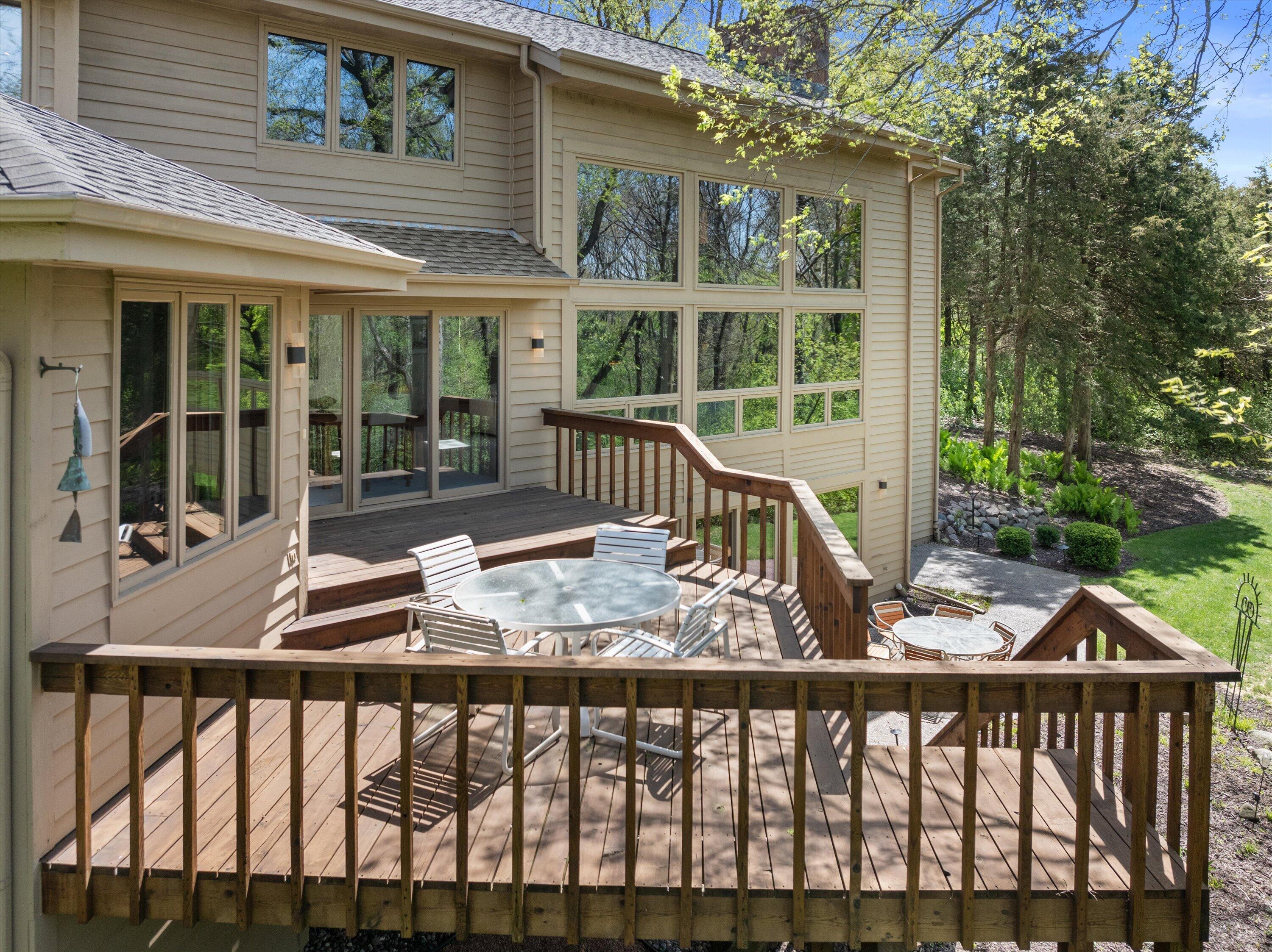 1161 North Lost Woods Road Summit, WI 53066 - Photo 37 of 66 Wonderful deck overlooking the wooded grounds.