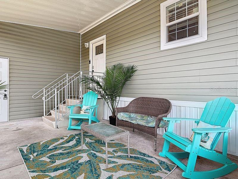102 Ash Street Edgewater, FL 32141 - Photo 2 of 36 a view of a chair and table in backyard