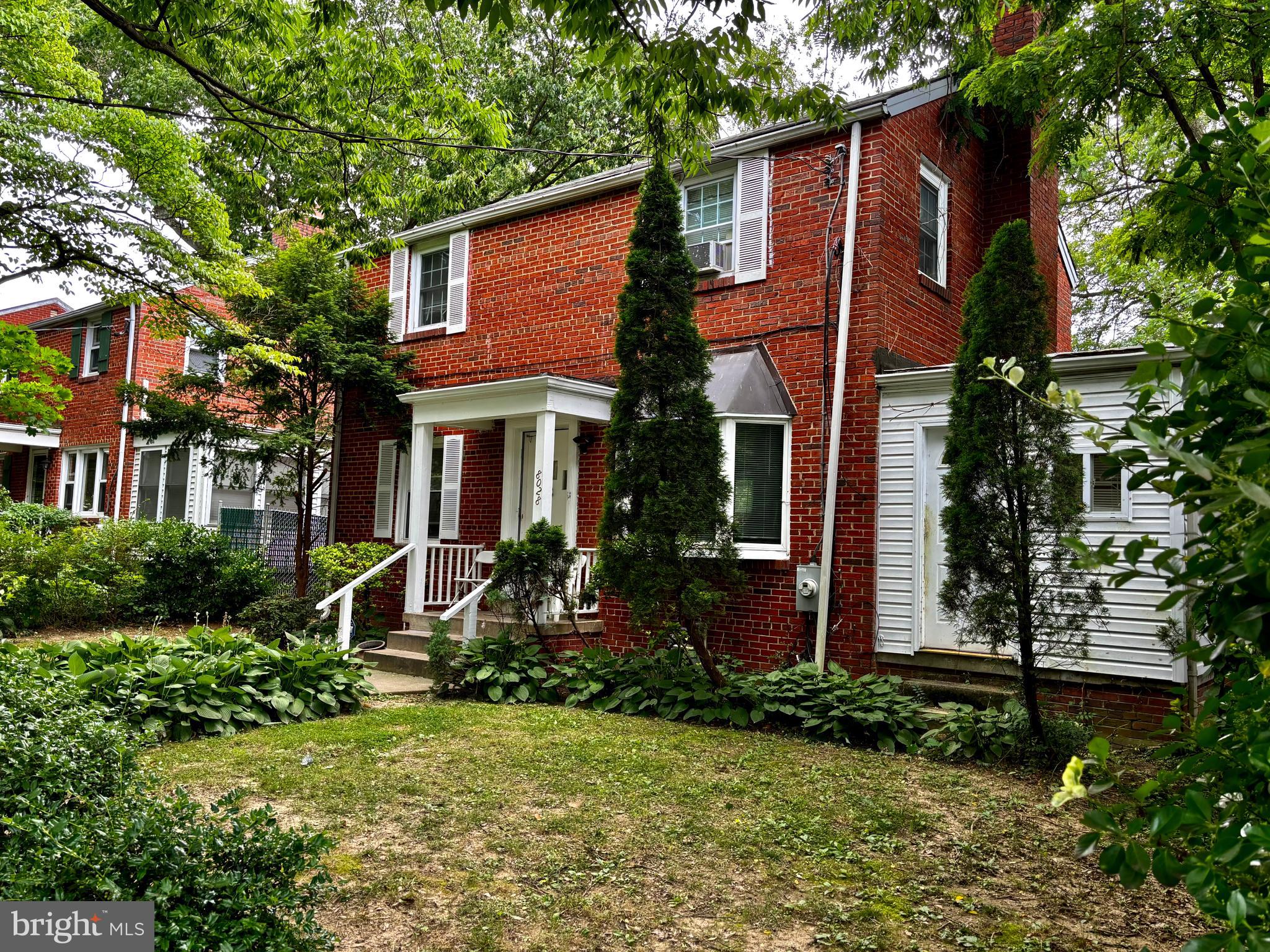 8028 Eastern Avenue Northwest Washington, DC 20012 - Photo 20 of 54 front view of a house with a yard