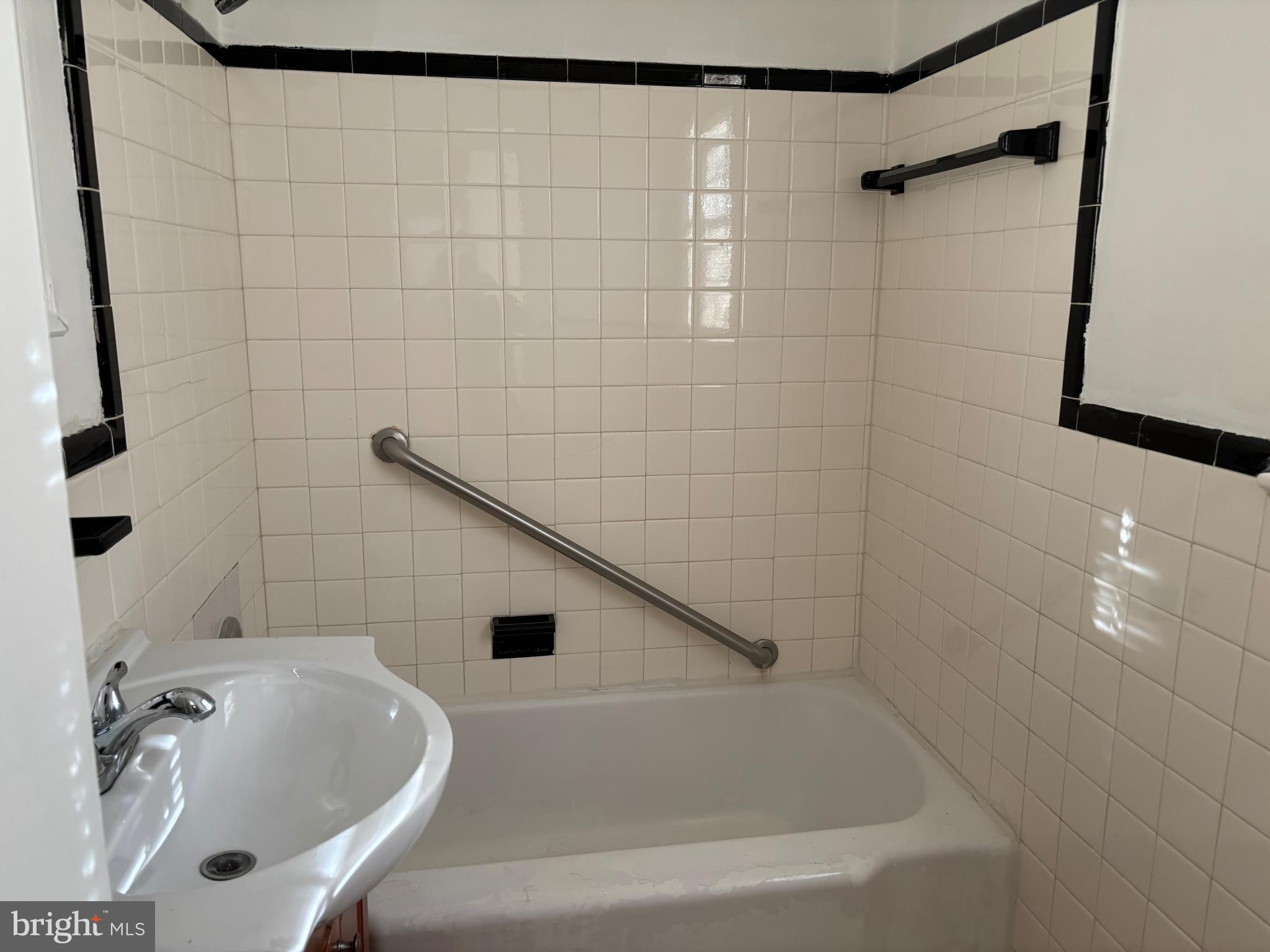 8028 Eastern Avenue Northwest Washington, DC 20012 - Photo 31 of 54 a bathroom with a sink and a shower