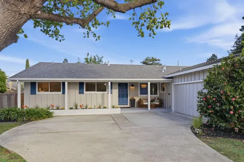 front view of a house with a yard
