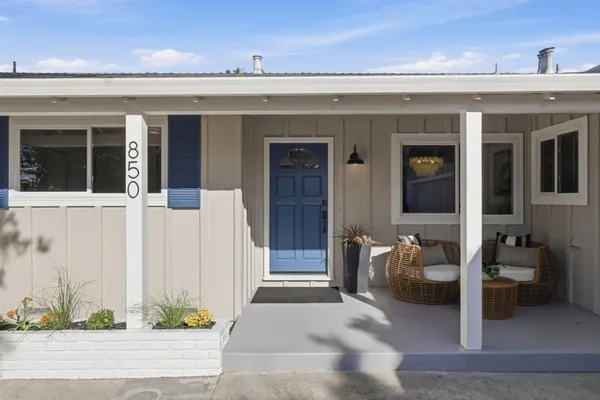 a front view of a house with a outdoor space