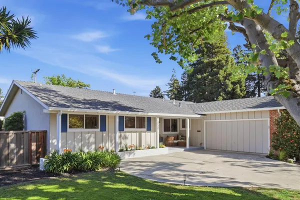 front view of a house with a yard