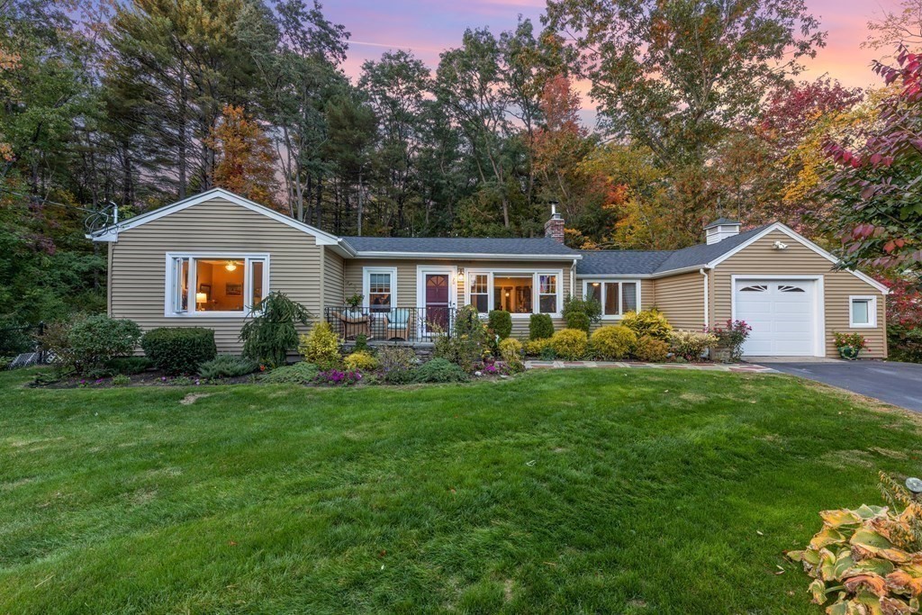 20 Howell Road Sudbury, MA 01776 - Photo 30 of 39 a front view of house with yard and green space