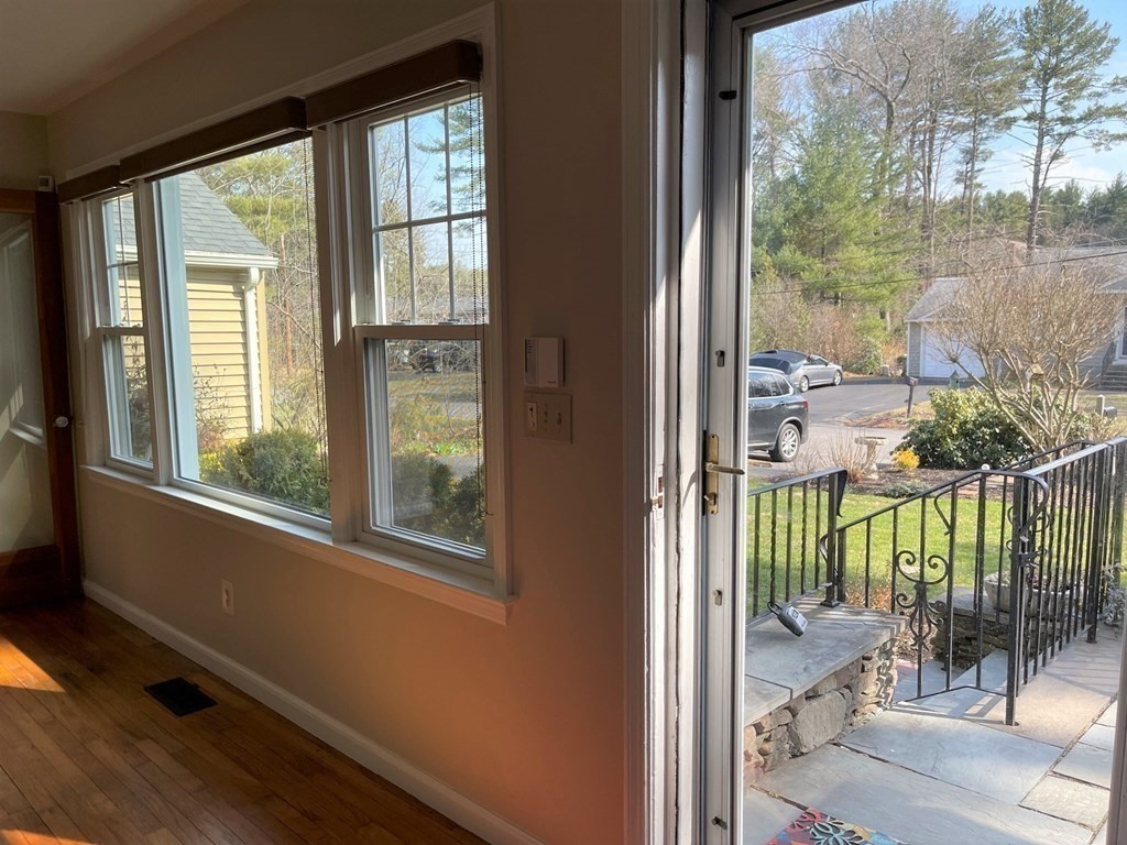 20 Howell Road Sudbury, MA 01776 - Photo 8 of 39 a view of a glass door and deck