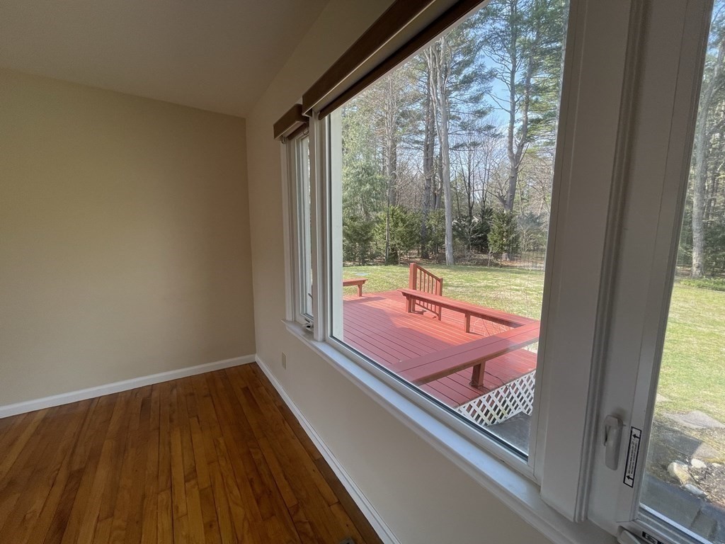 20 Howell Road Sudbury, MA 01776 - Photo 9 of 39 a sitting area with wooden floor