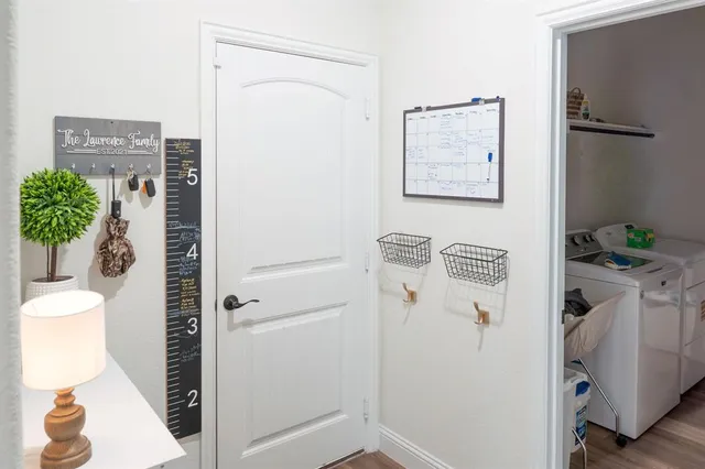 a bedroom with a bed and a table in it