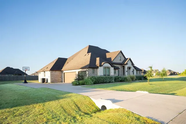 a bathroom with a shower and a sink