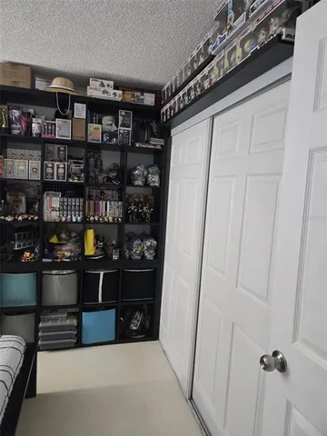 a room with wine shelf