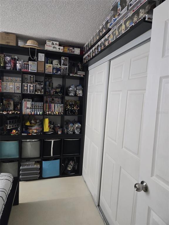 9410 Live Oak Place, Unit 103 Davie, FL 33324 - Photo 25 of 49 a room with wine shelf