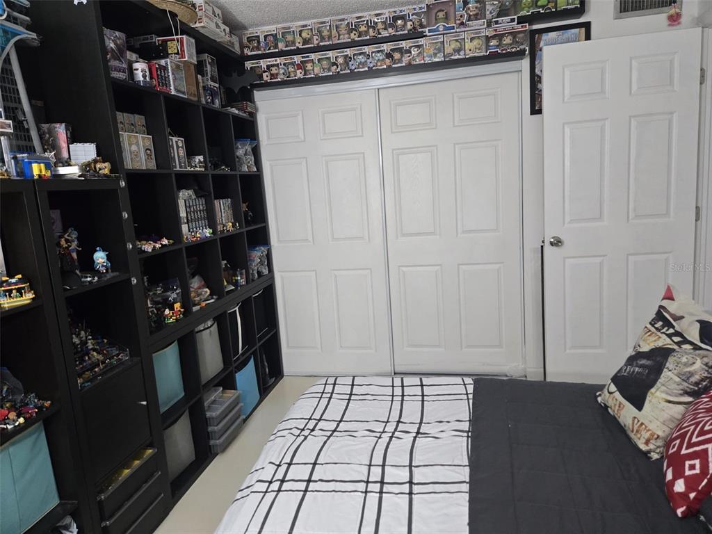 9410 Live Oak Place, Unit 103 Davie, FL 33324 - Photo 28 of 49 a view of walk in closet