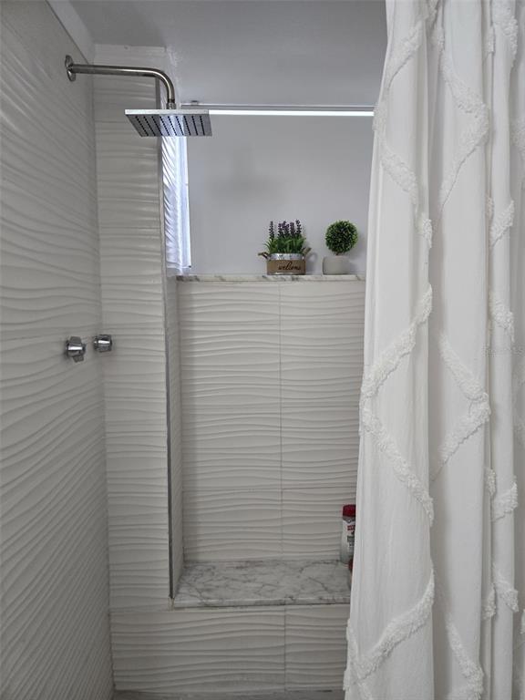 9410 Live Oak Place, Unit 103 Davie, FL 33324 - Photo 30 of 49 a bathroom with a shower