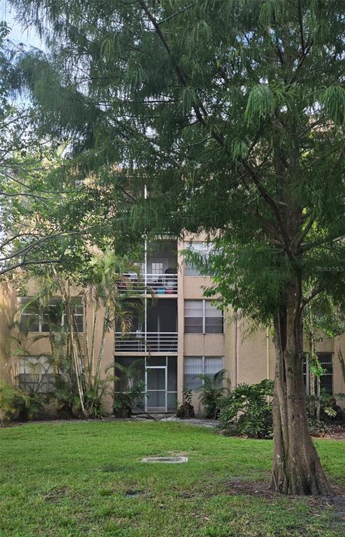 9410 Live Oak Place, Unit 103 Davie, FL 33324 - Photo 36 of 49 a view of a house with a yard