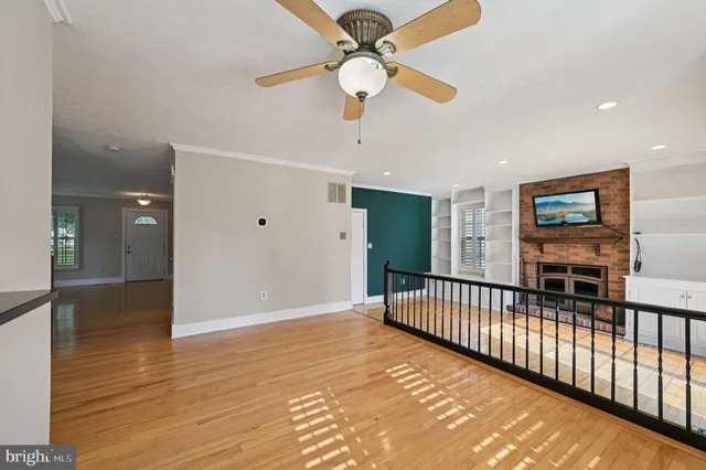 a view of a livingroom with a hardwood floor