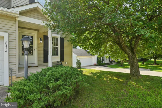 a house view with a garden space