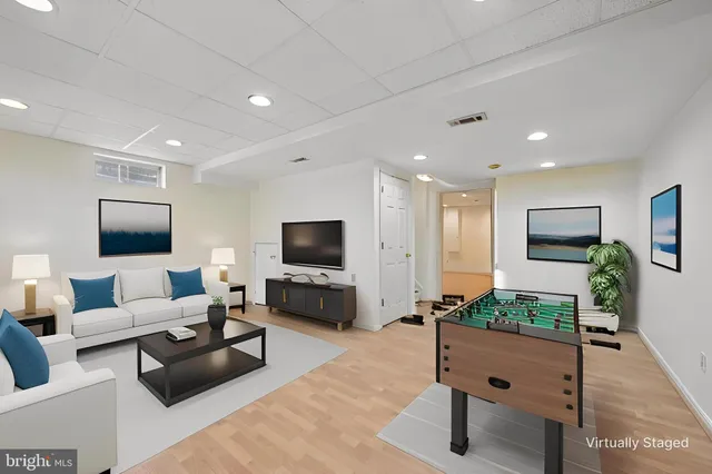 a view of a livingroom with wooden floor